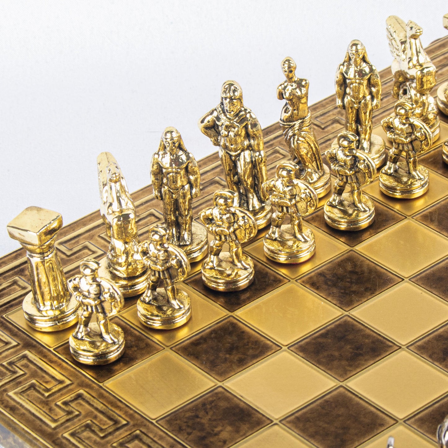 SPARTAN WARRIOR CHESS SET with gold/silver chessmen and Meander bronze chessboard 28 x 28cm (Small) - Premium Chess from MANOPOULOS Chess & Backgammon - Just €168! Shop now at MANOPOULOS Chess & Backgammon