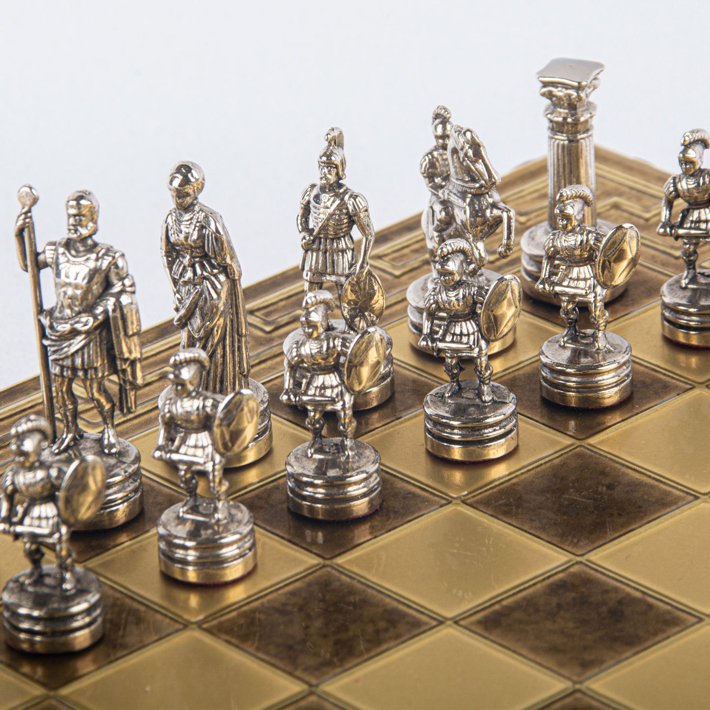 GREEK ROMAN PERIOD CHESS SET with gold/silver chessmen and meander bronze chessboard 28 x 28cm (Small) - Premium Chess from MANOPOULOS Chess & Backgammon - Just €138! Shop now at MANOPOULOS Chess & Backgammon