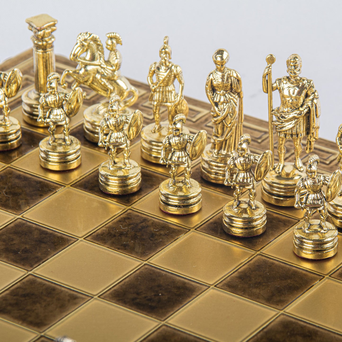 GREEK ROMAN PERIOD CHESS SET with gold/silver chessmen and meander bronze chessboard 28 x 28cm (Small) - Premium Chess from MANOPOULOS Chess & Backgammon - Just €138! Shop now at MANOPOULOS Chess & Backgammon