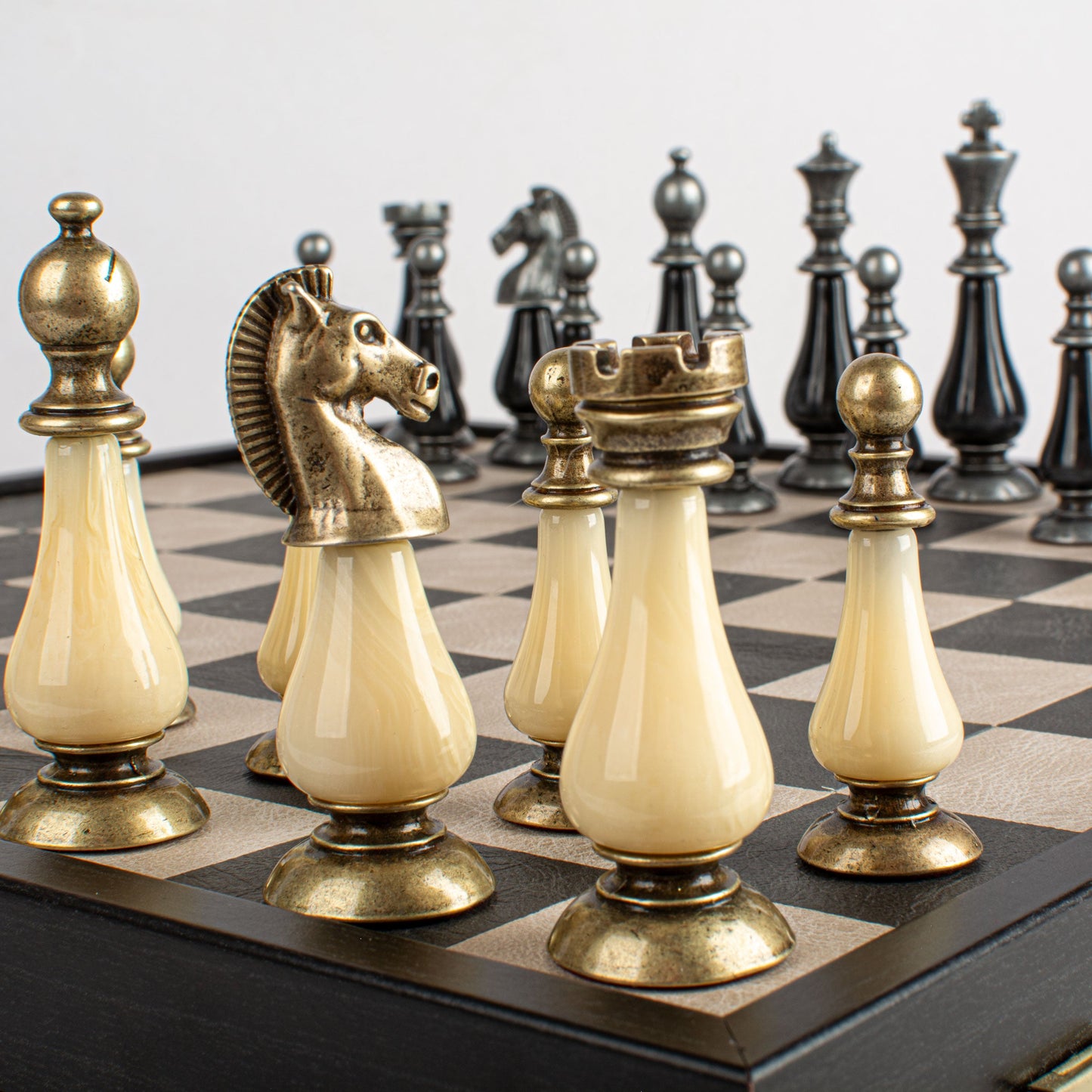 Black/White Leather Chessboard - 50x50cm with Brass and Pewter Finish Chessmen & Pearl Elements - Premium Chess from MANOPOULOS Chess & Backgammon - Just €318! Shop now at MANOPOULOS Chess & Backgammon