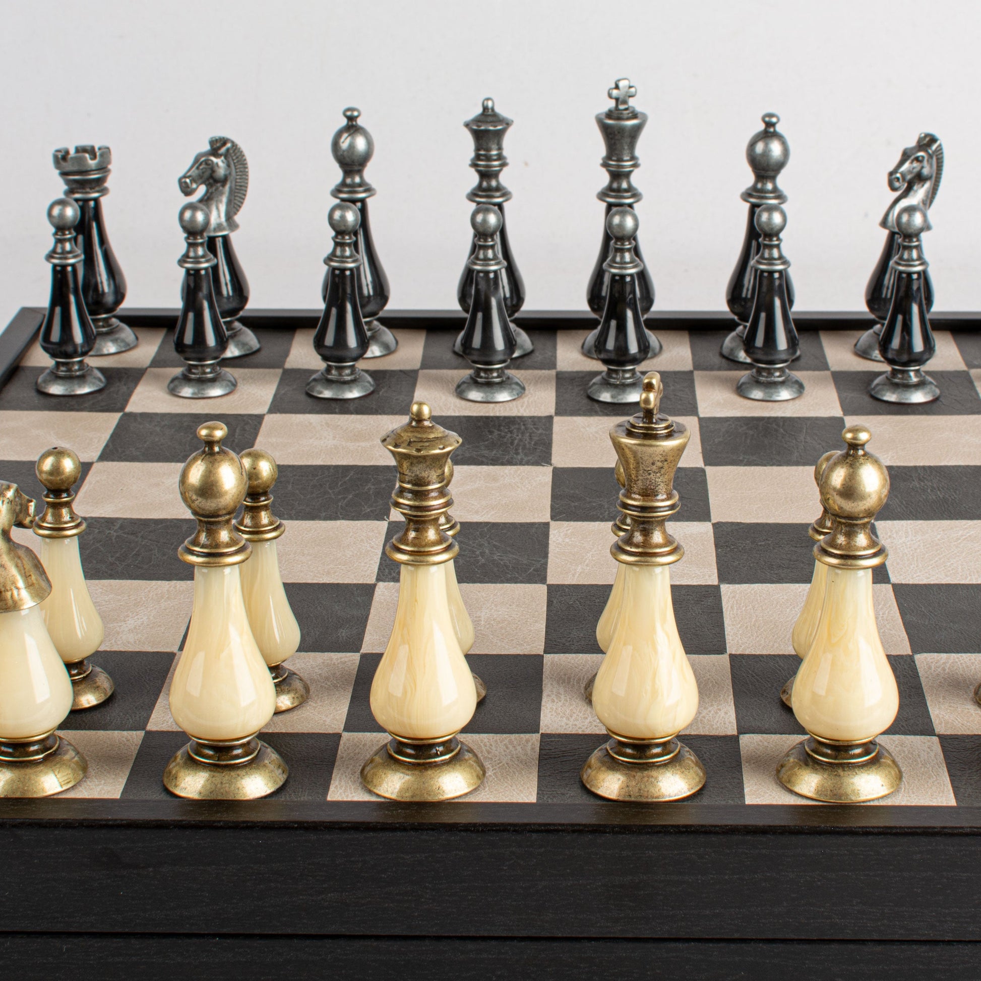 Black/White Leather Chessboard - 50x50cm with Brass and Pewter Finish Chessmen & Pearl Elements - Premium Chess from MANOPOULOS Chess & Backgammon - Just €318! Shop now at MANOPOULOS Chess & Backgammon