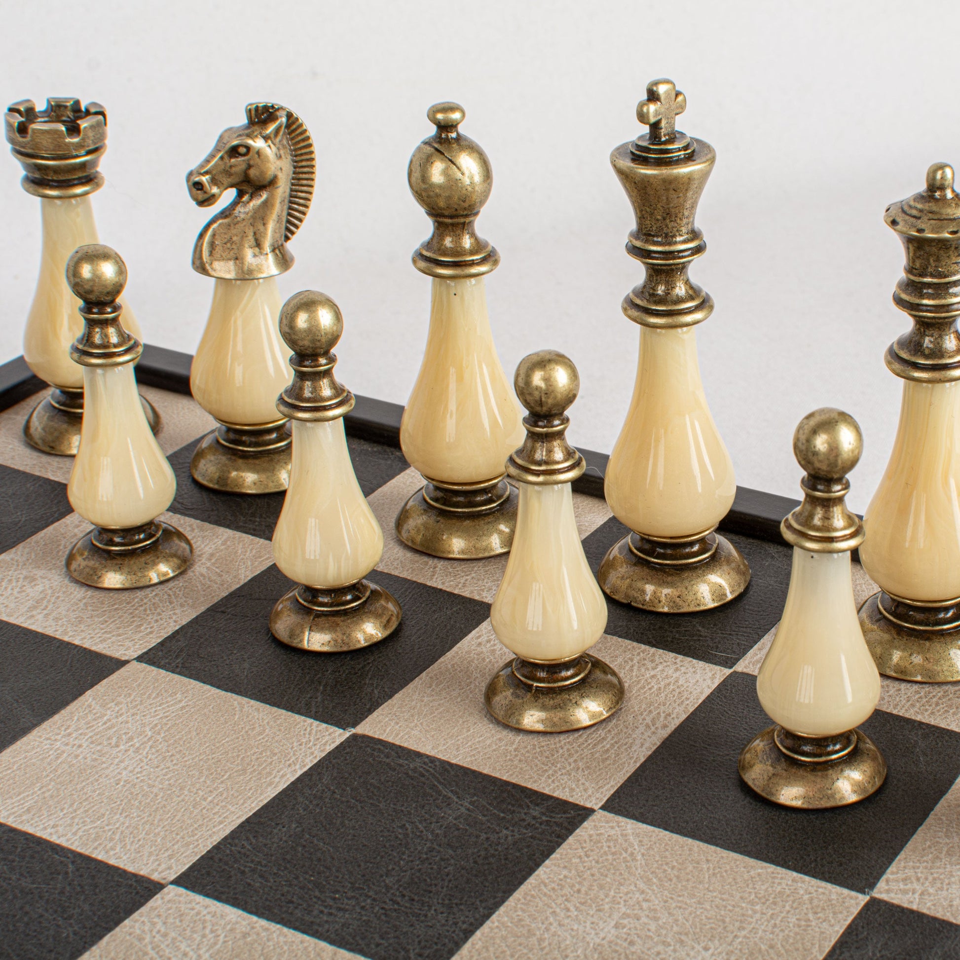 Black/White Leather Chessboard - 50x50cm with Brass and Pewter Finish Chessmen & Pearl Elements - Premium Chess from MANOPOULOS Chess & Backgammon - Just €318! Shop now at MANOPOULOS Chess & Backgammon