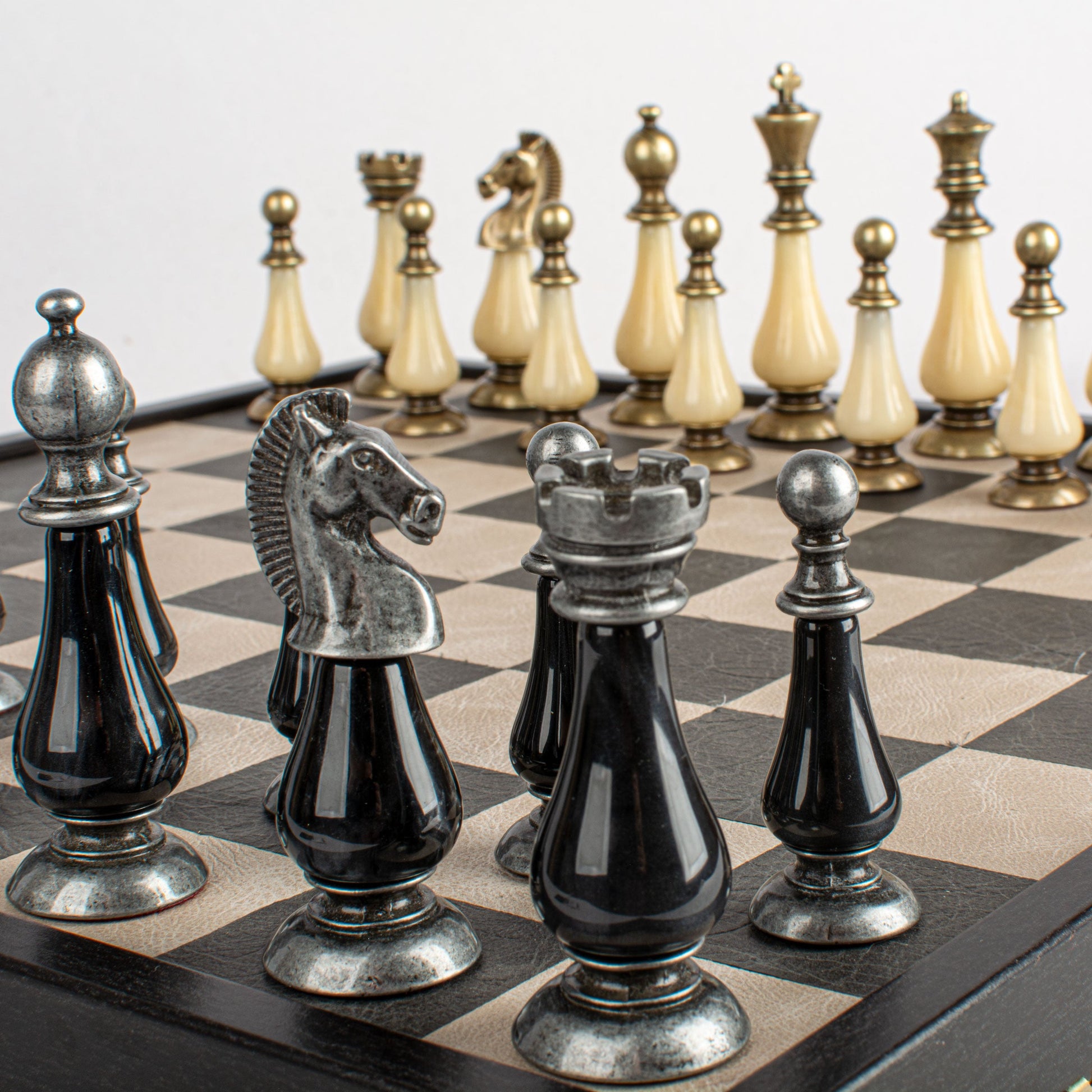 Black/White Leather Chessboard - 50x50cm with Brass and Pewter Finish Chessmen & Pearl Elements - Premium Chess from MANOPOULOS Chess & Backgammon - Just €318! Shop now at MANOPOULOS Chess & Backgammon